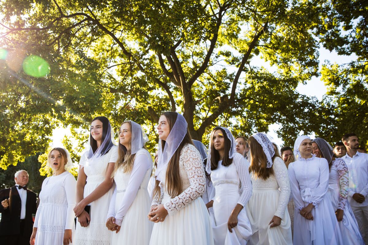 Members of the Bethany Slavic Missionary Church prepare to be baptized on September 8, 2019 in Sacramento.