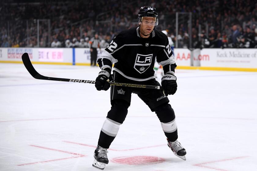 Kings right wing Trevor Lewis forechecks during a 5-3 loss to the Canucks on Oct. 30 at Staples Center. 