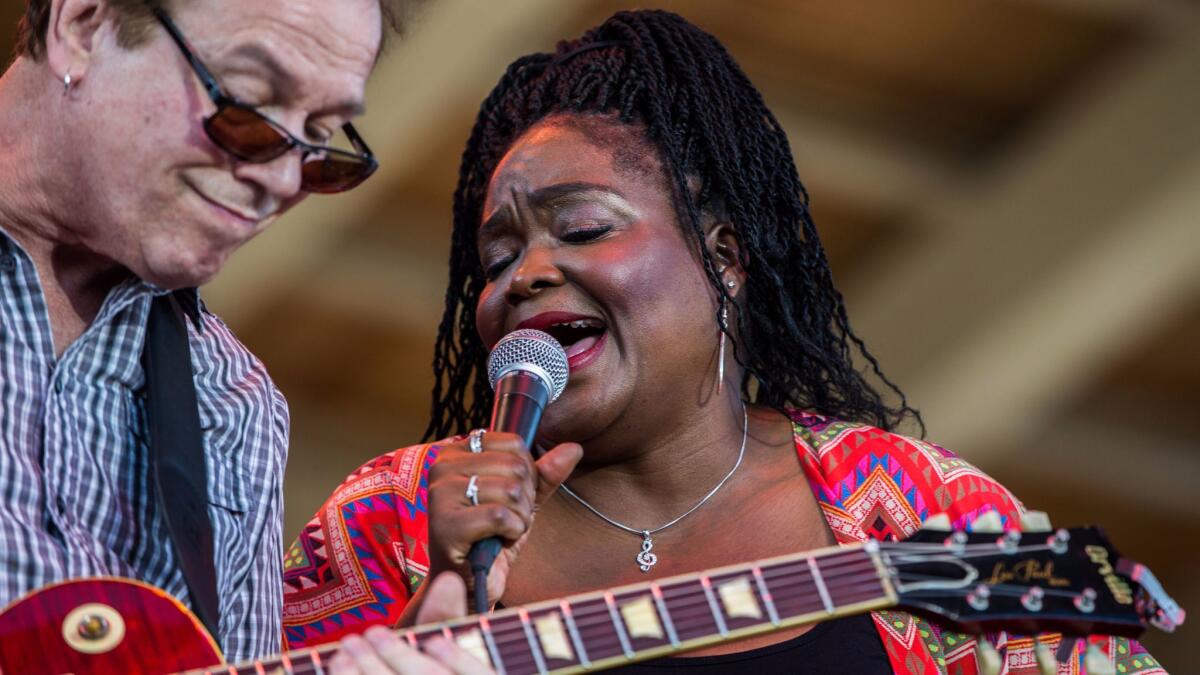 Shemekia Copeland, right, with guitarist Arthur Neilson at Blues on the Fox festival in Aurora, Ill.