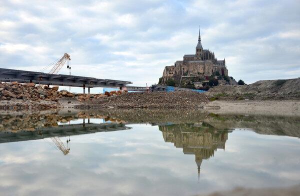The new bridge, scheduled to be completed in 2014, will cater to pedestrians and shuttles carrying visitors to and from Mont St. Michel.