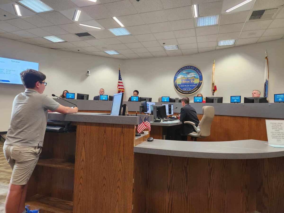 A young resident addresses the City Council on Tuesday during a study session at Fountain Valley City Hall.