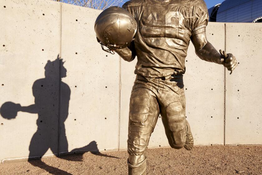 College Football: Playoff National Championship: Closeup of statue of former Arizona Cardinals player Pat Tillman outside of stadium before Alabama vs Clemson game at University of Phoenix Stadium. Tillman left the NFL to enlist in the army and was killed in Afghanistan in 2004. Glendale, AZ 1/11/2016 CREDIT: Robert Beck (Photo by Robert Beck /Sports Illustrated via Getty Images) (Set Number: SI-155 TK1 )