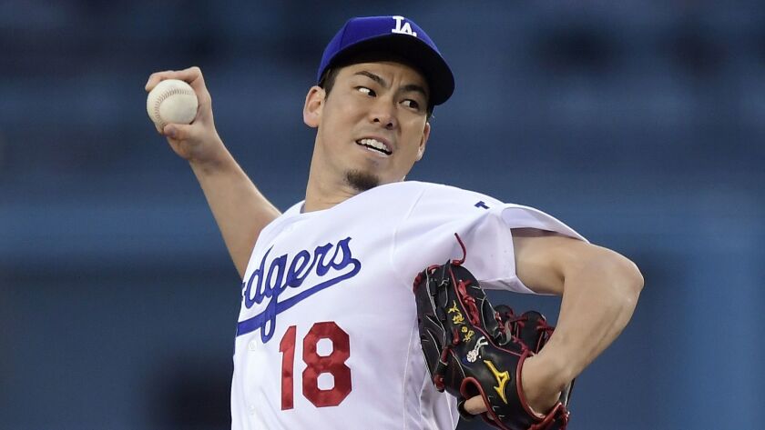 Dodgers starting pitcher Kenta Maeda delivers during the first inning of a 2-0 victory over the San Diego Padres on May 15.