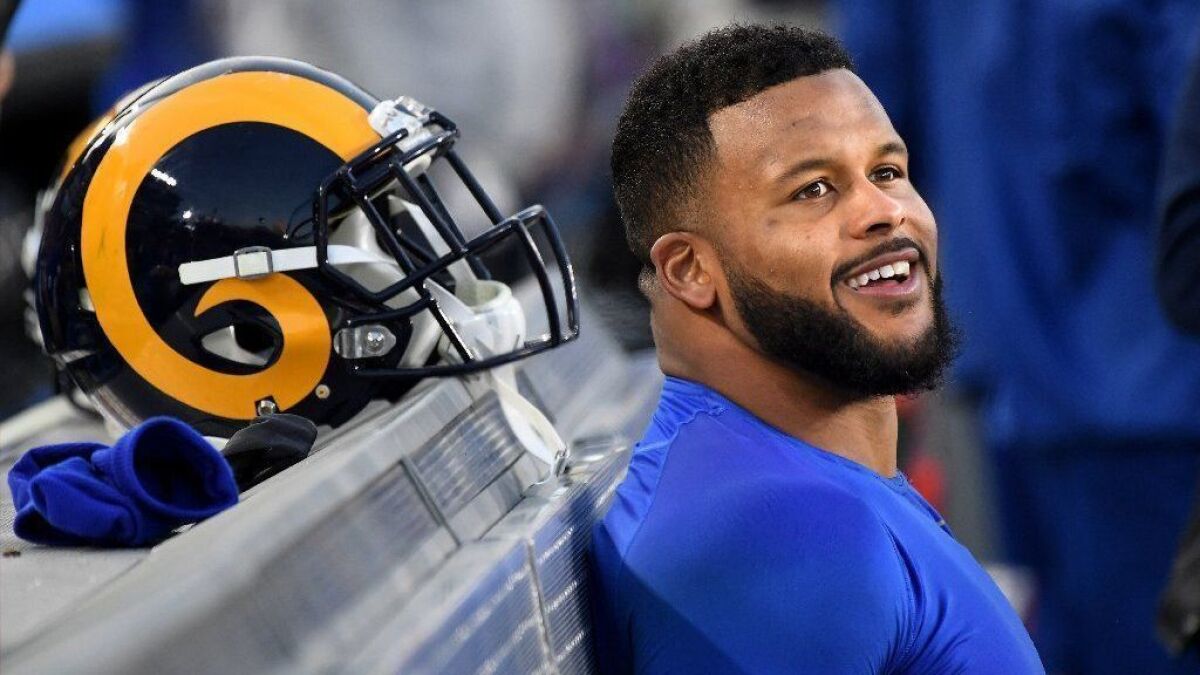 Rams defensive tackle Aaron Donald sits on the bench during a game against the 49ers at the Coliseum this season.