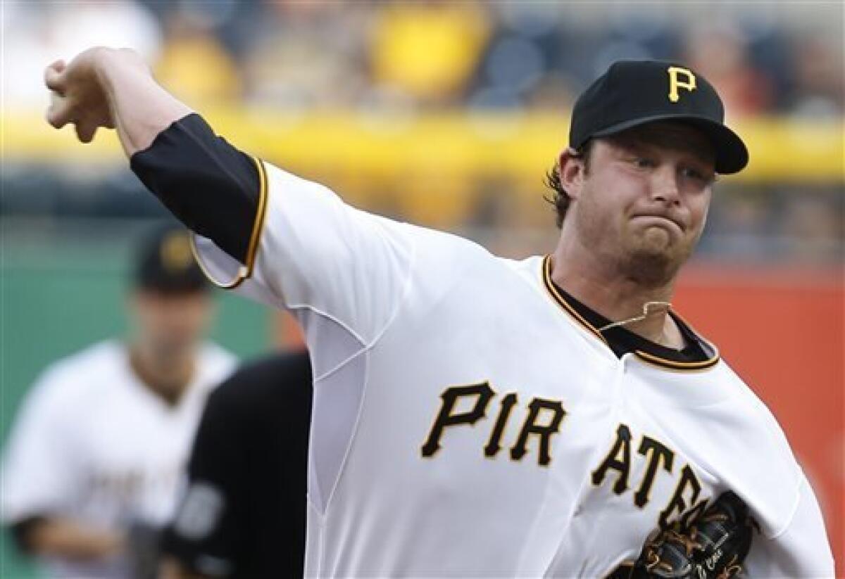 Pittsburgh Pirates Pedro Alvarez tosses his bat and walks to first