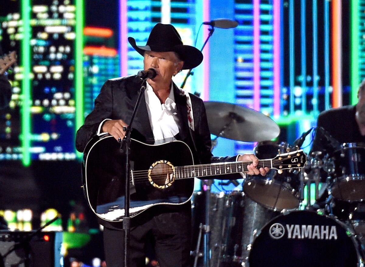 George Strait performs during the 50th Academy of Country Music Awards at AT&T Stadium on April 19, 2015, in Arlington, Texas.