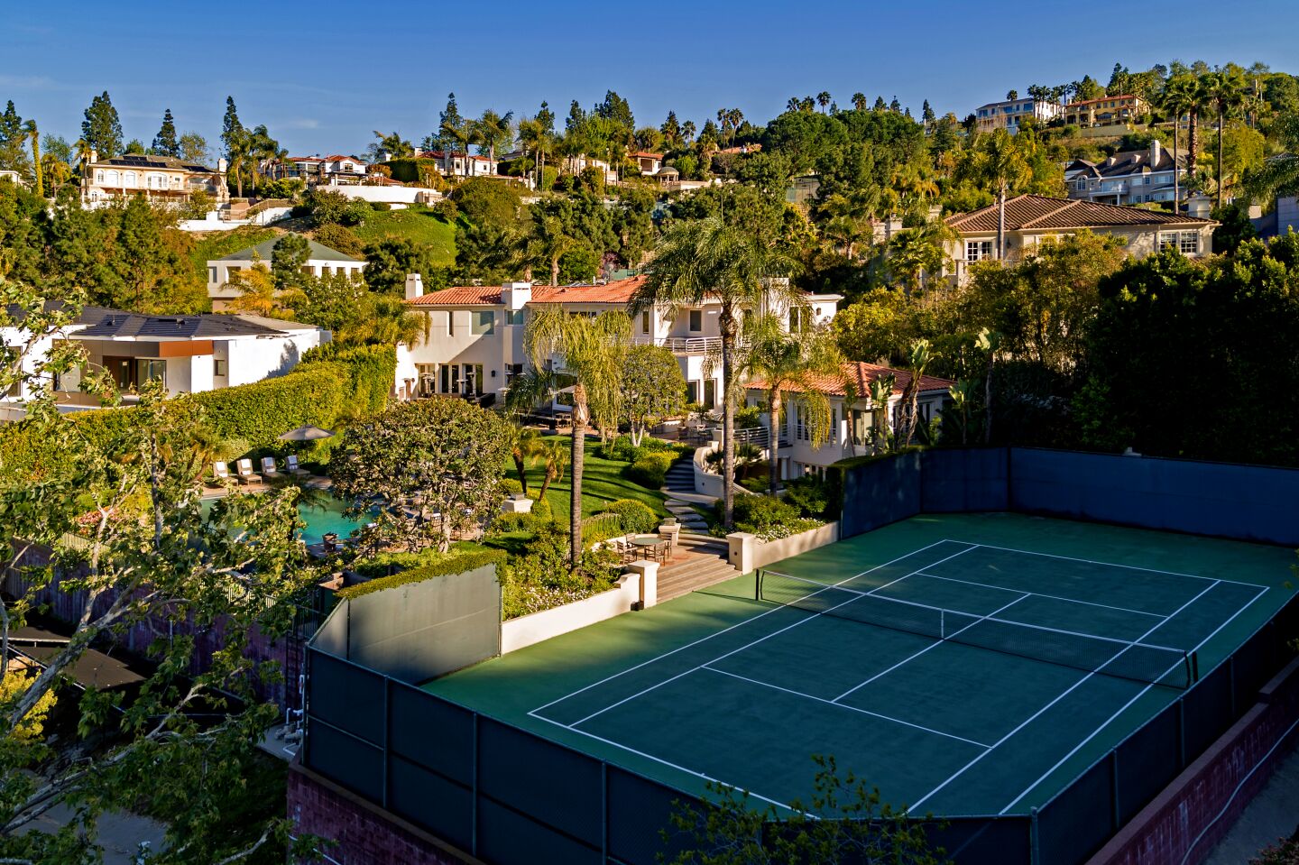 Media mogul Jules Haimovitz has listed his hillside mansion in the Beverly Hills Post Office area for $21.32 million.