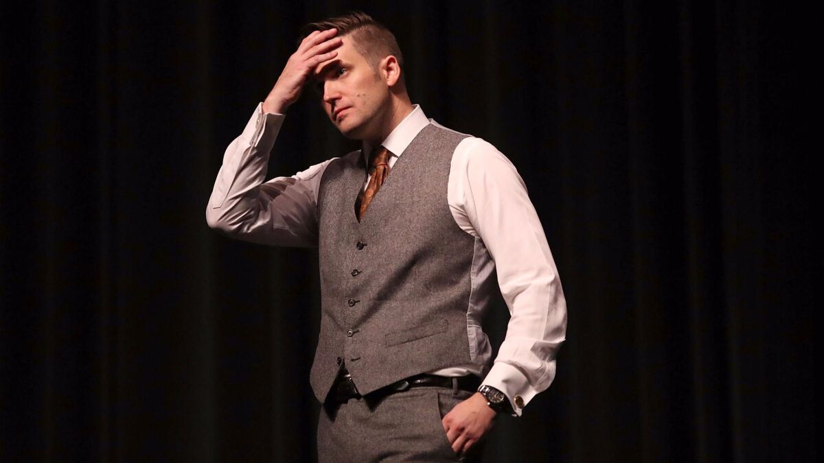 White nationalist Richard Spencer speaks at the University of Florida in October. His nonprofit group's initial payment for rental space and security for that event bounced because of insufficient funds.