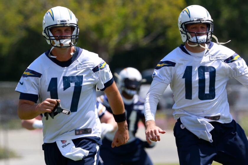 SAN DIEGO CA, USA -- JUNE 6, 2016: Chargers Philip Rivers (L) and Kellen Clemens stretched before a recent OTA (organized team activities) at the team's training facility in San Diego. Mandatory Credit: PHOTO BY NELVIN C. CEPEDA, SAN DIEGO UNION-TRIBUNE