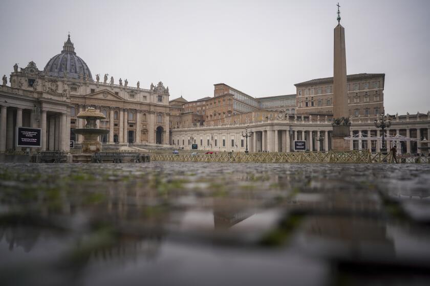 A view of the empty St. Peter's Square as Pope Francis is delivering the Angelus noon prayer from his studio, at the Vatican, Sunday, Jan. 17, 2021. (AP Photo/Andrew Medichini)
