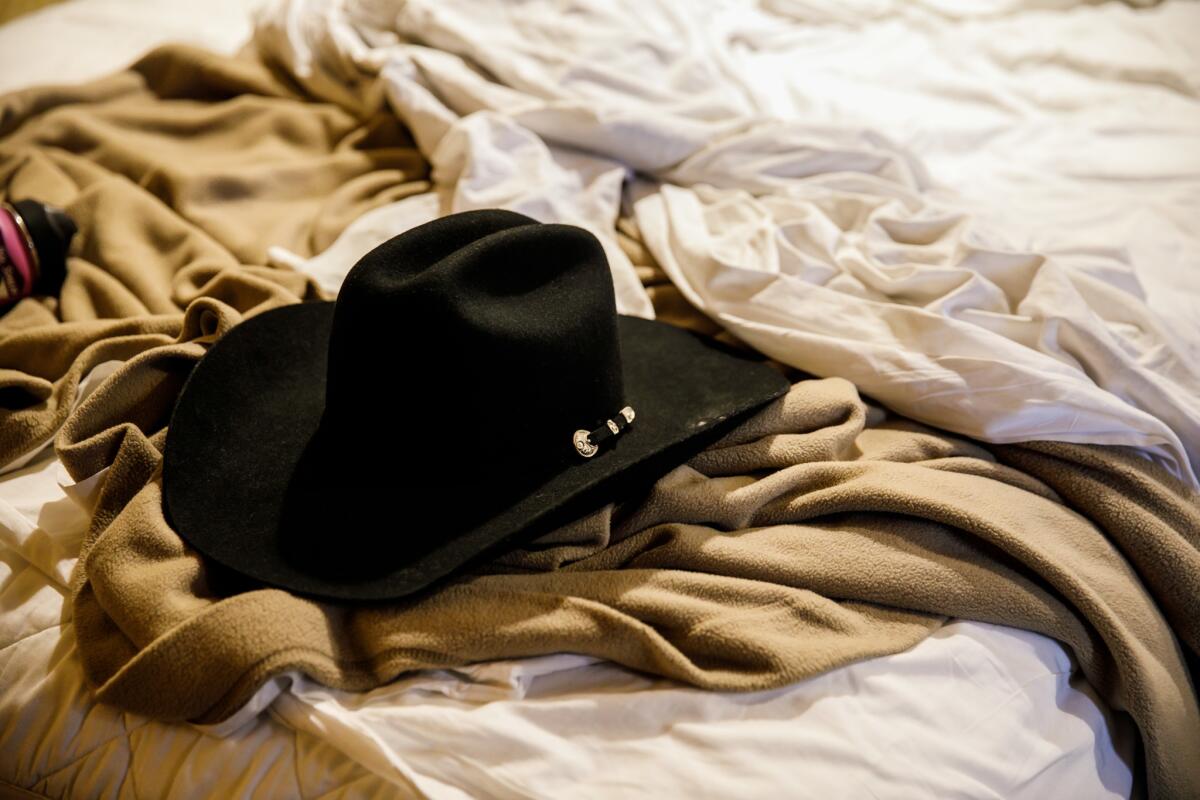 Brian MacKinnon retrieved Adrian Murfitt's new cowboy hat and took it back to their hotel room.