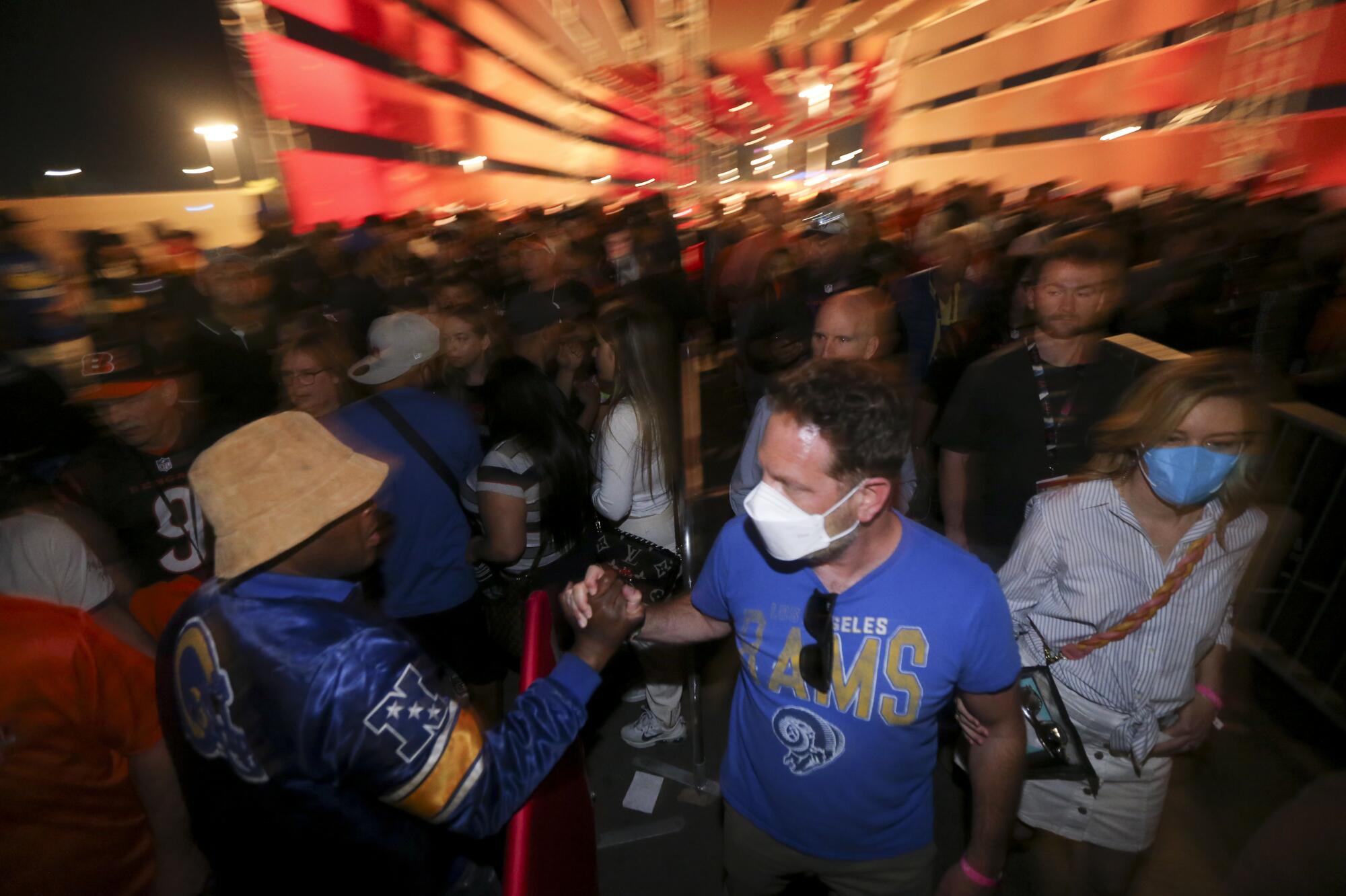 Fans celebrate outside after the Los Angeles Rams won Super Bowl LVI at SoFi Stadium.