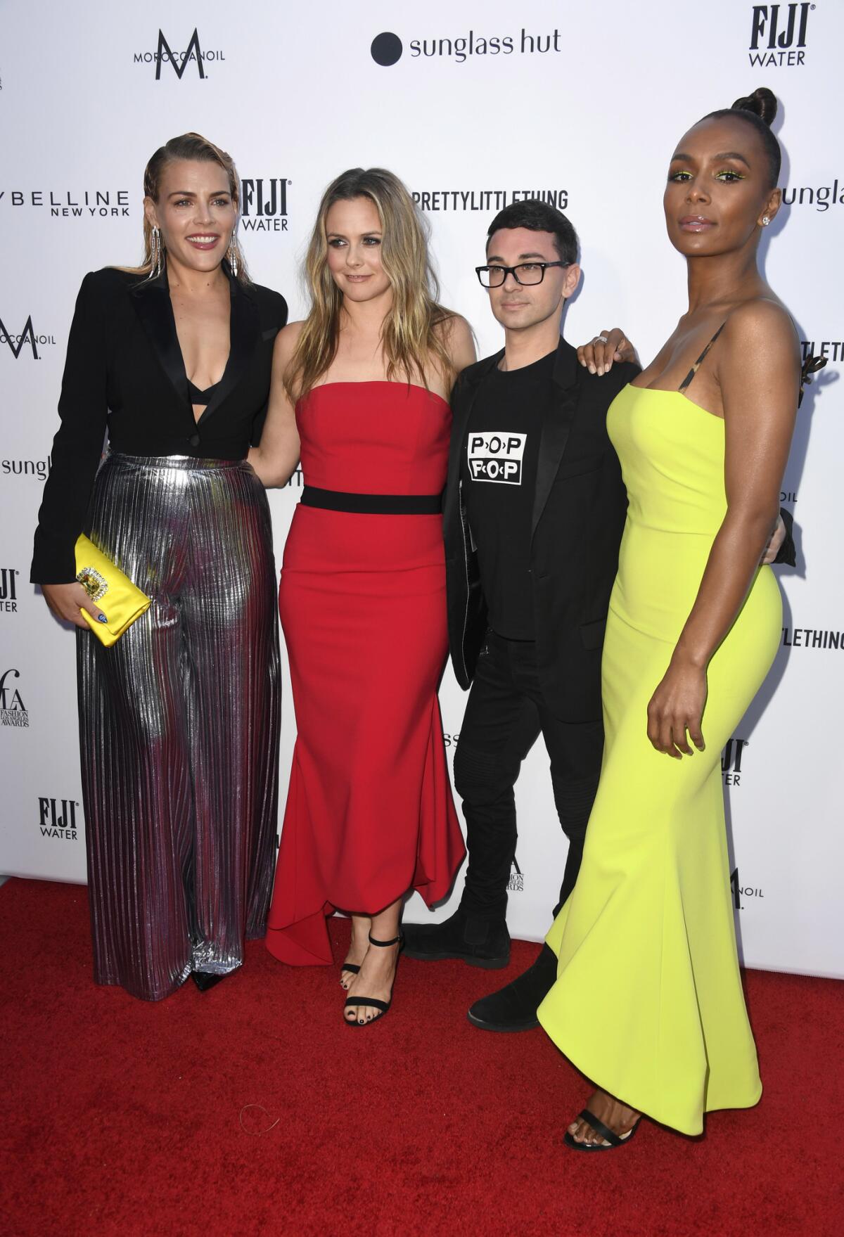 Busy Philipps, from left, Alicia Silverstone, Christian Siriano and Janet Mock on the red carpet at the Daily Front Row's Fashion Los Angeles Awards at the Beverly Hills Hotel in Beverly Hills on March 17.
