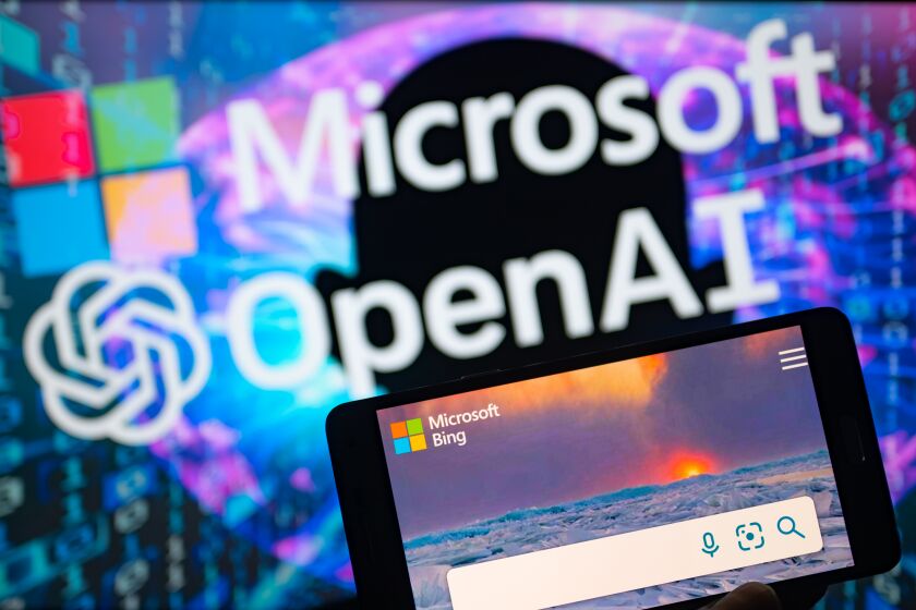 Microsoft and OpenAI seen on screen with Bing search engine app on mobile in this photo illustration, on 10 January 2023, in Brussels, Belgium. (Photo illustration by Jonathan Raa/NurPhoto via Getty Images)