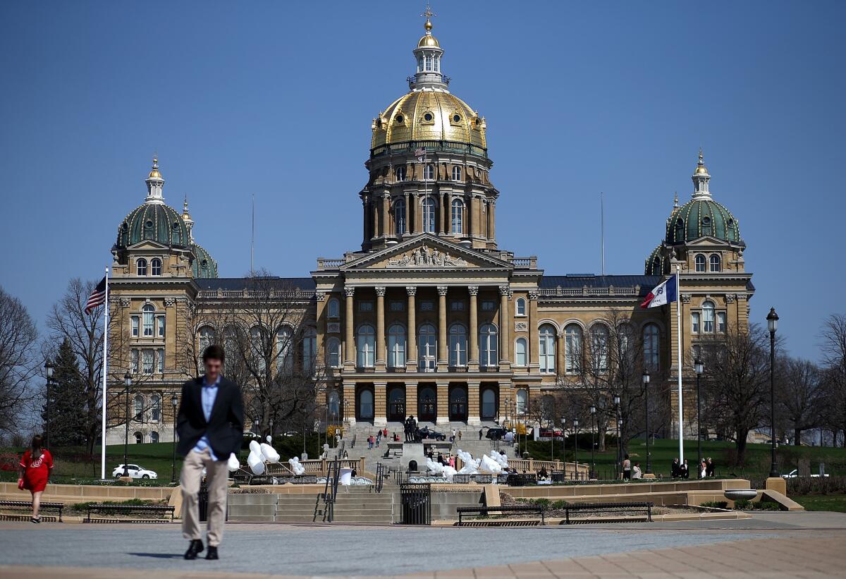 The Iowa state Capitol in Des Moines. Hillary Rodham Clinton is traveling in a van on a road trip to her first official campaign events in Iowa on Tuesday.