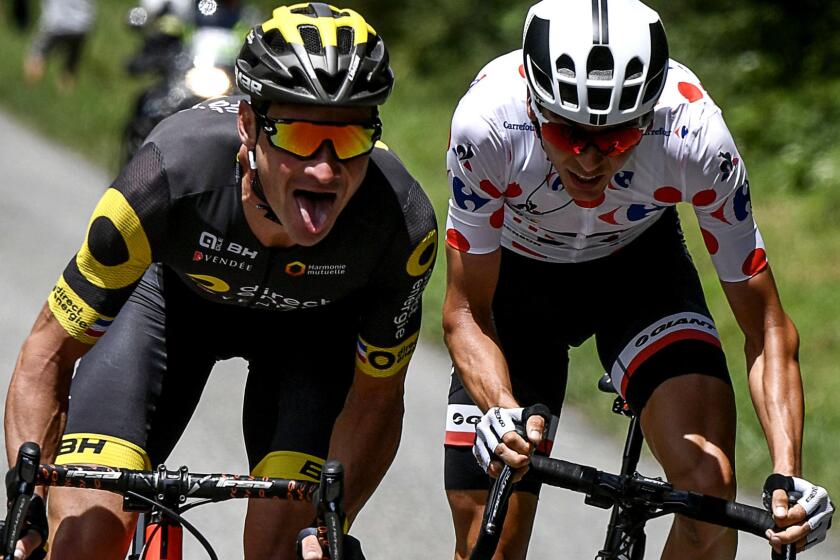 France's Thomas Voeckler (L) and France's Warren Barguil wearing the best climber's polka dot jersey ride in a breakaway during the 101 km thirteenth stage of the 104th edition of the Tour de France cycling race on July 14, 2017 between Saint-Girons and Foix. / AFP PHOTO / PHILIPPE LOPEZPHILIPPE LOPEZ/AFP/Getty Images ** OUTS - ELSENT, FPG, CM - OUTS * NM, PH, VA if sourced by CT, LA or MoD **
