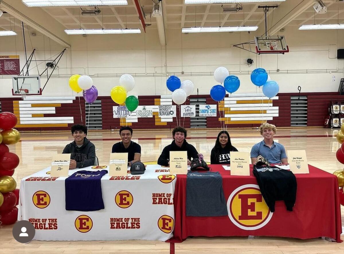 Estancia's Jaedon Hose-Shea, Denilson Mendoza, Andrew Mits, Ana Pacheco and John Uchytil participate in a signing day event.