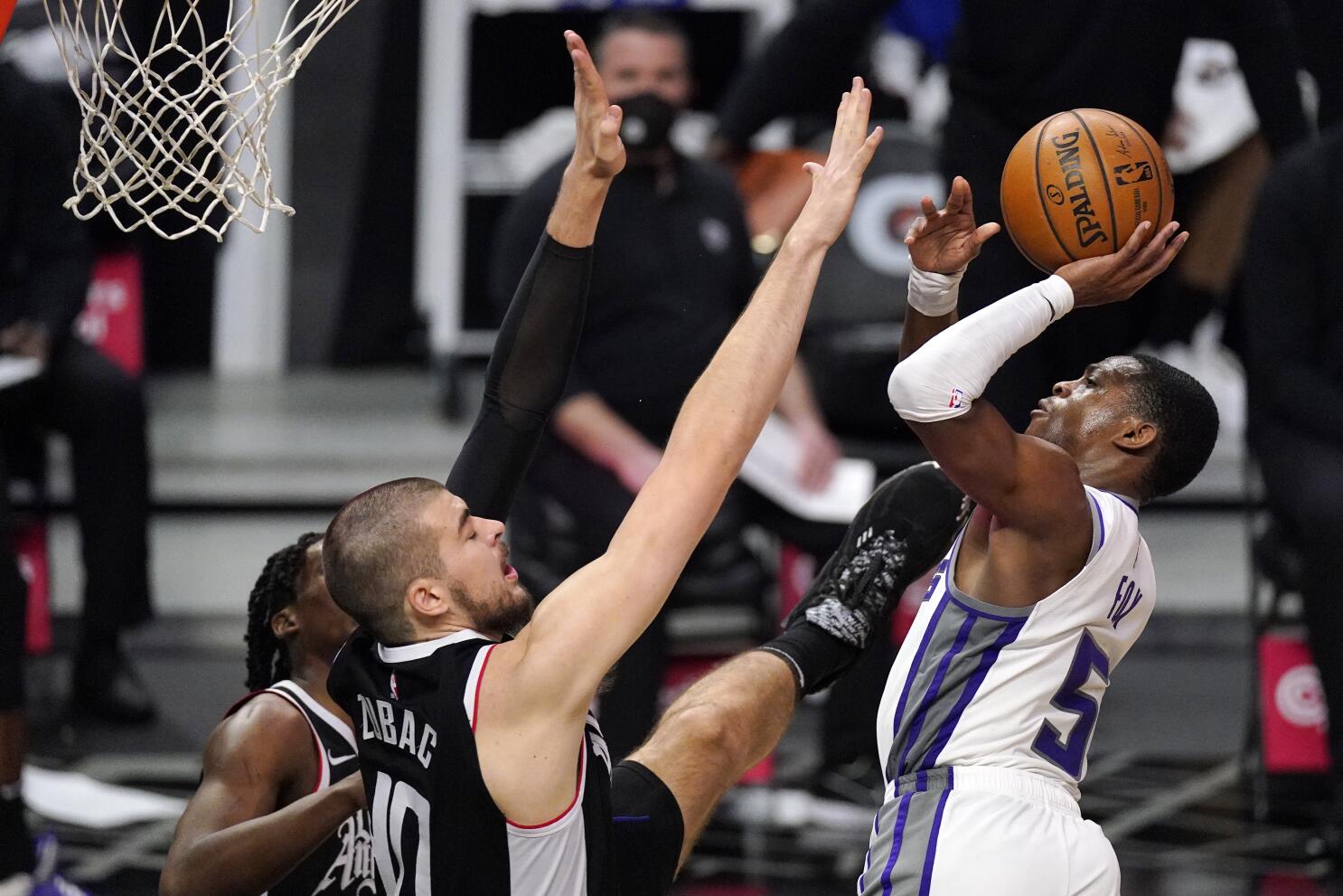 Streaking Kings win 4th straight, beat Clippers 113-110 - The San