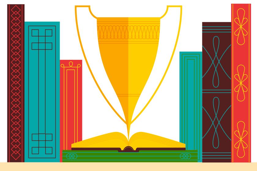 A trophy with a base in the shape of an open book sits on a shelf sandwiched between upright books with decorative spines.