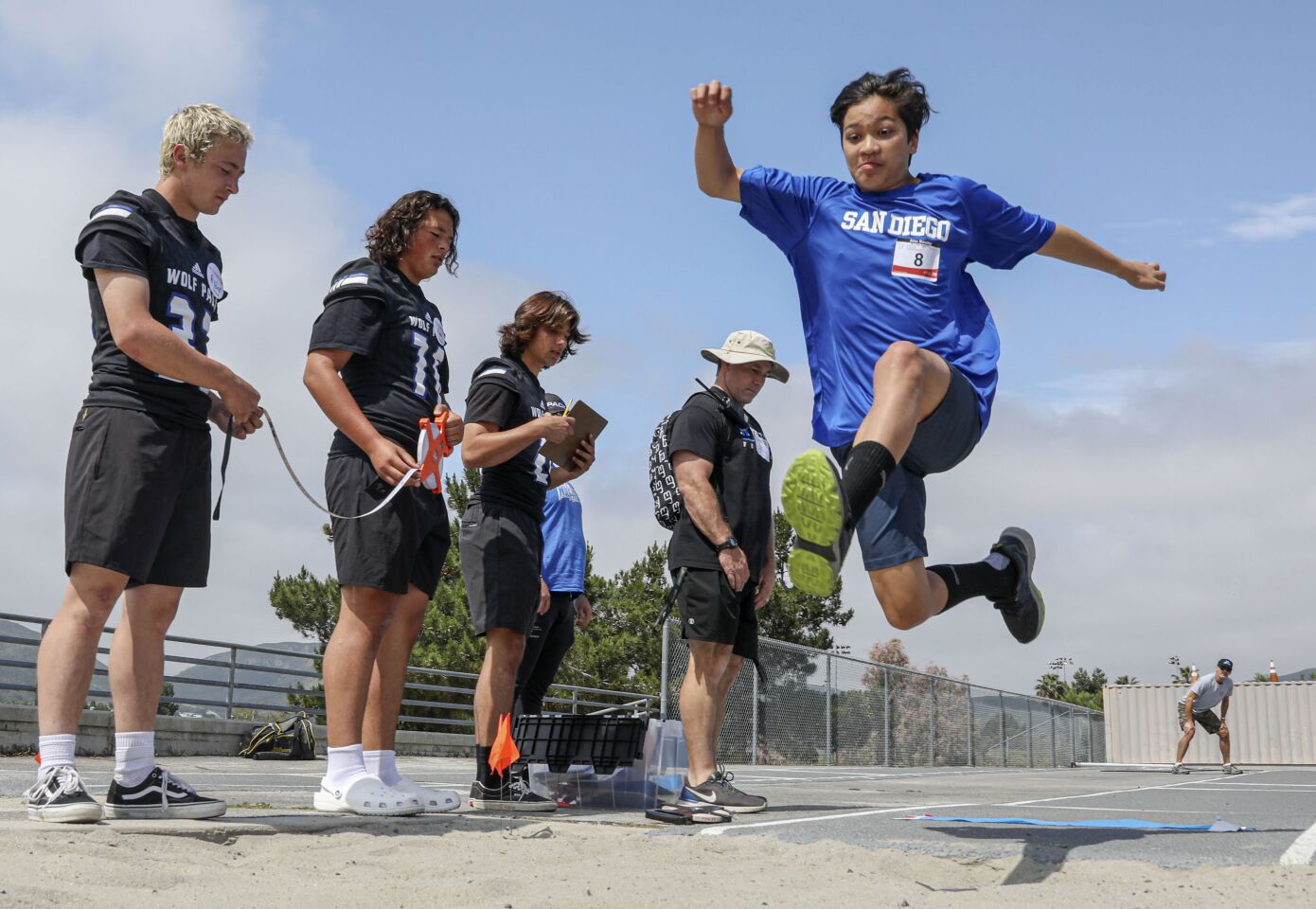 Alex Rowley, 14, competes in the long jump at the Special Olympics Southern California’s spring games at West Hills High School in Santee, CA on Saturday, May 20, 2023.