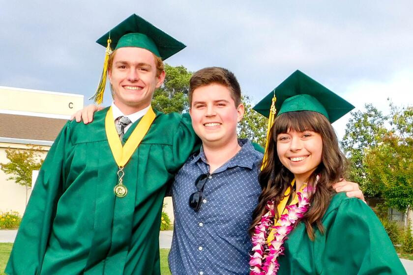 Aidan Pedersen, Matthew Lehman and Margaret Wagner. Lehman surprised his friends by flying from Tennessee for the graduation.
