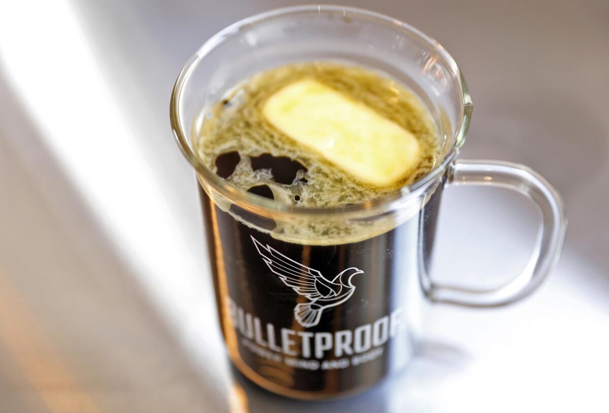Bulletproof coffee with unsalted, grass-fed butter added before it is mixed in a blender at Bulletproof Coffee in Santa Monica.