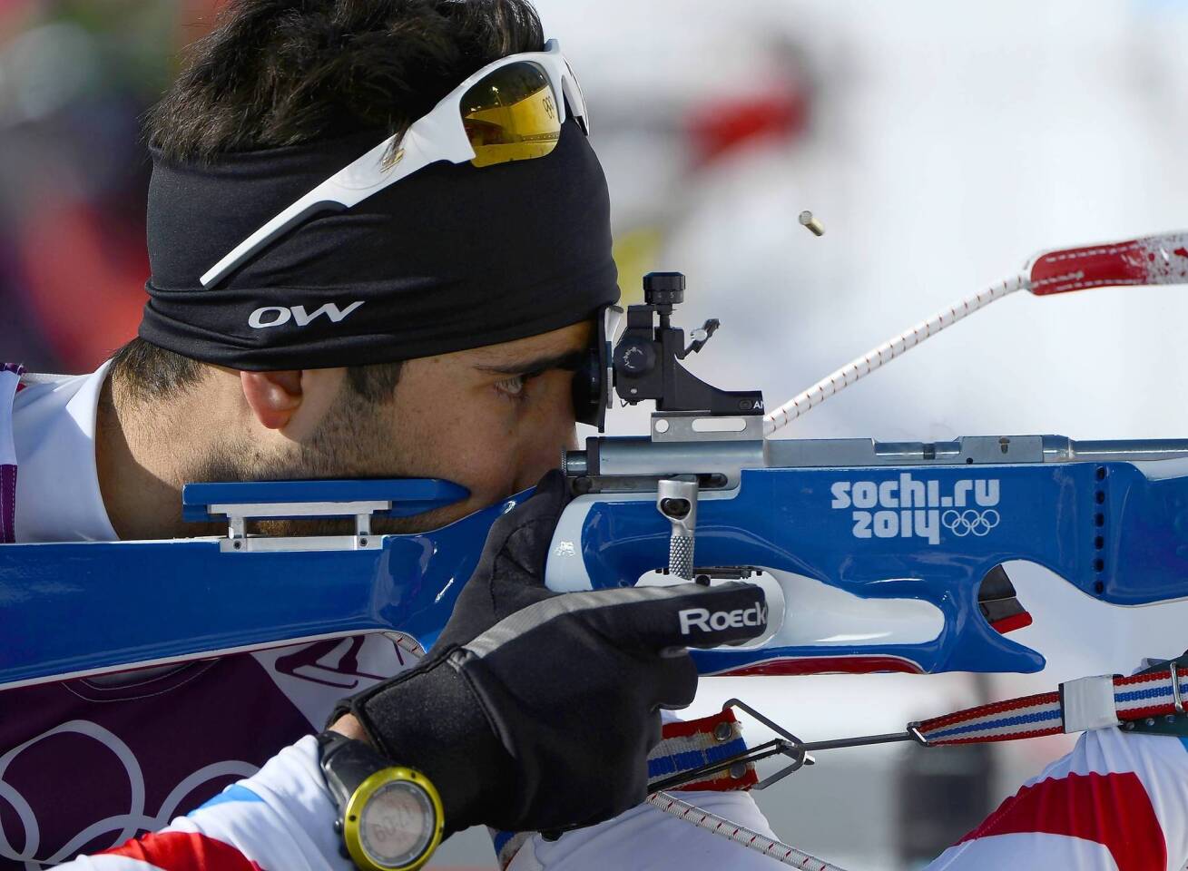 France's biathlon athlete Martin Fourcade ejects a shell during a training session at the Laura Cross Country Skiing and Biathlon Centre in Rosa Khutor.