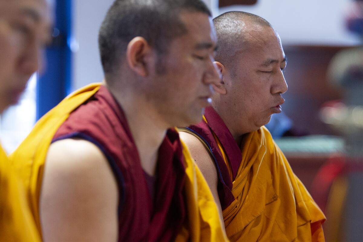 Tibetan monks chant during the White Tara Mandala at the Sawdust Festival in 2019.