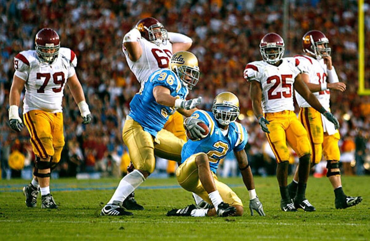Linebacker Eric McNeal (2) provided the play of the game in 2006 by tipping a John David Booty pass near the line of scrimmage in the fourth quarter and making the interception to preserve a 13-9 victory for UCLA. The loss would deny the Trojans a third consecutive trip to the BCS title game.