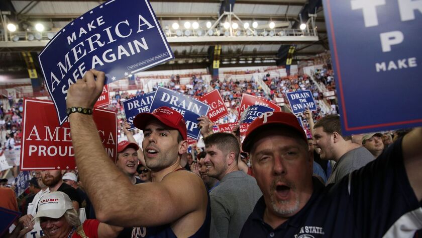 Supporters of Donald Trump cheer before the president takes the stage at a campaign-style rally in Harrisburg, Pa., on April 29, 2017.