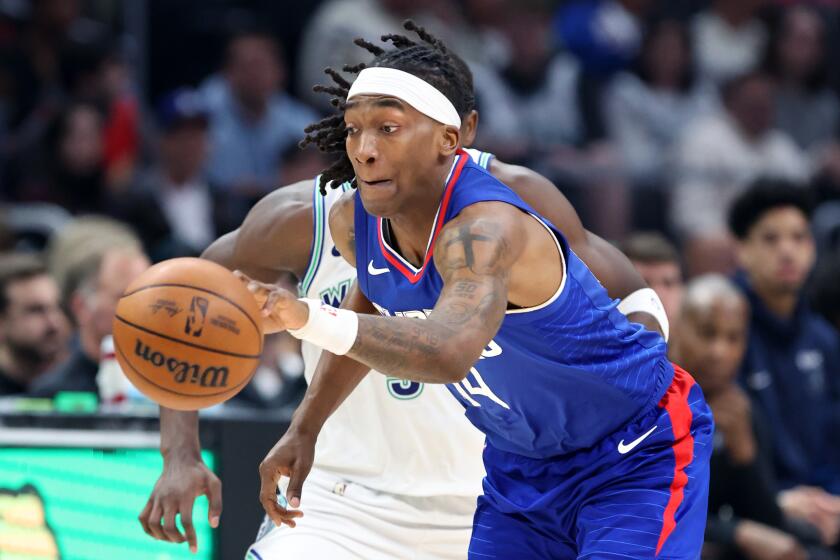 Los Angeles, California March 12, 2024-Clippers Terance Mann steals the ball.