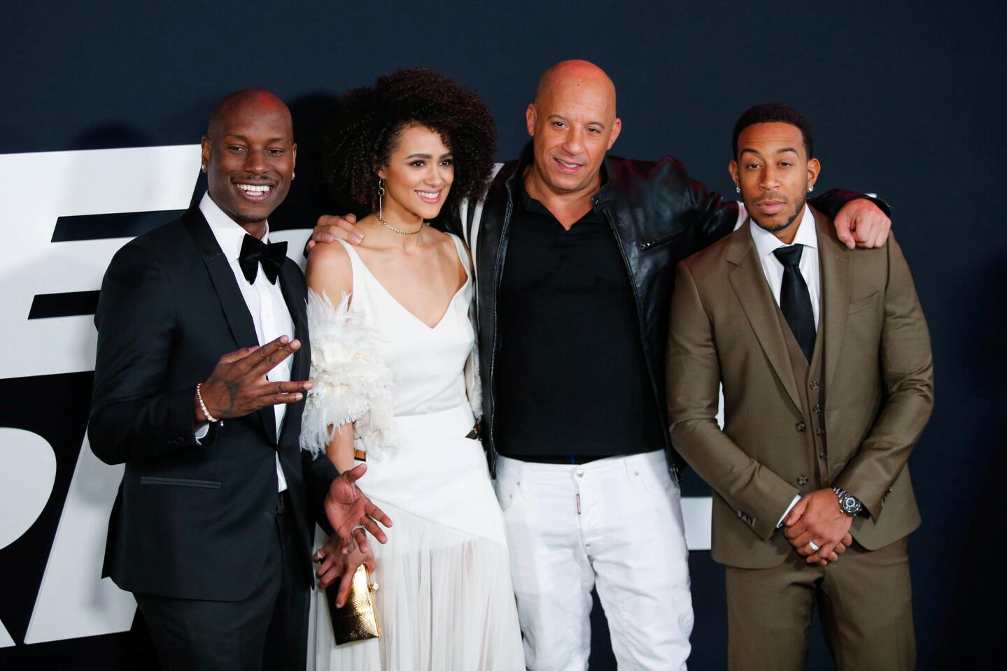 Actors Tyrese Gibson, Nathalie Emmanuell, Vin Diesel and Ludacris attend 'The Fate Of The Furious' New York premiere at Radio City Music Hall in New York
