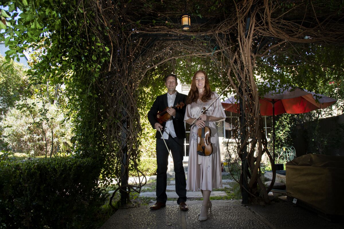 Musicians Rob Brophy and Tereza Stanislav with their instruments. 