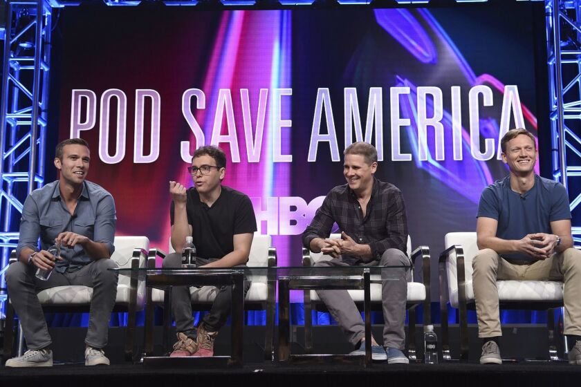 Jon Favreau, from left, Jon Lovett, Dan Pfeiffer and Tommy Vietor participate in the "Pod Save America" panel during the HBO Television Critics Association Summer Press Tour at The Beverly Hilton hotel on Wednesday, July 25, 2018, in Beverly Hills, Calif. (Photo by Richard Shotwell/Invision/AP)