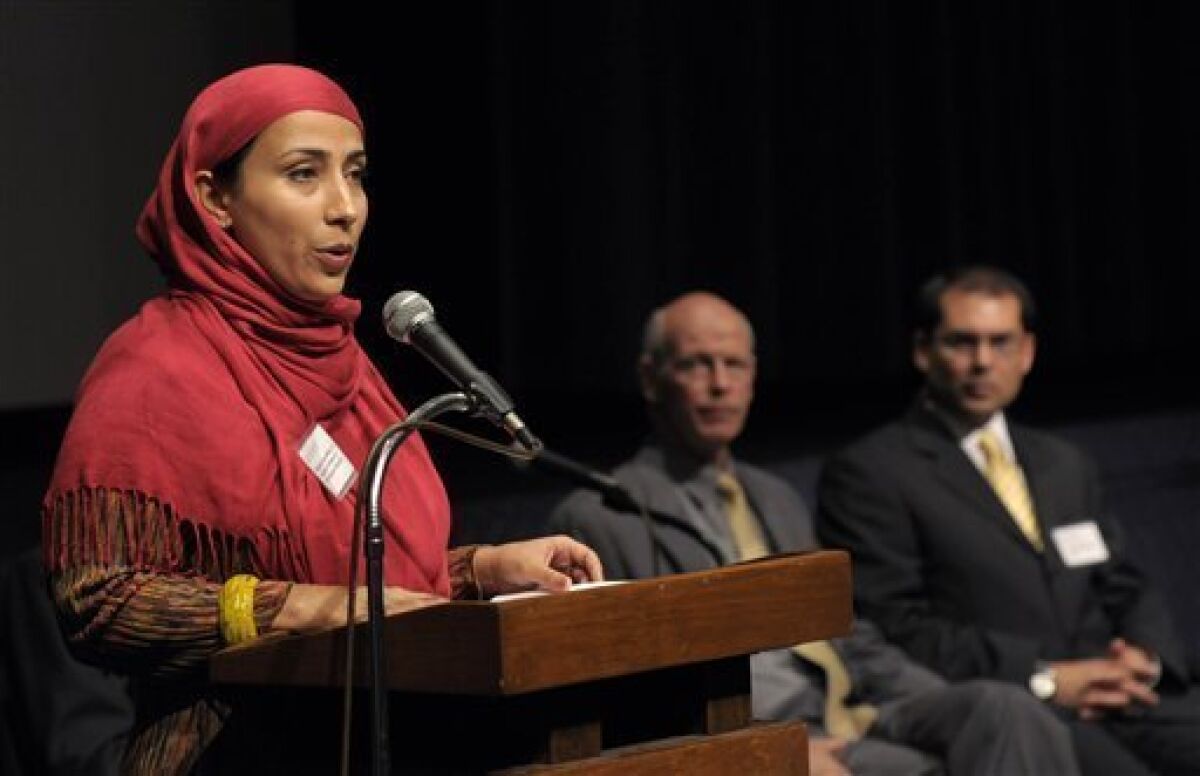 Najeeba Syeed-Miller, Assistant Professor of Interreligious Education, speaks while Rabbi Mel Gottlieb and Imam Jihad Turk, from left, listen at a press conference at Claremont School of Theology announcing the launch of the University Project, which will integrate the education of ministers, rabbis and Muslim religious leaders, on Wednesday, June 9, 2010, in Claremont, Calif. (AP Photo/Adam Lau)