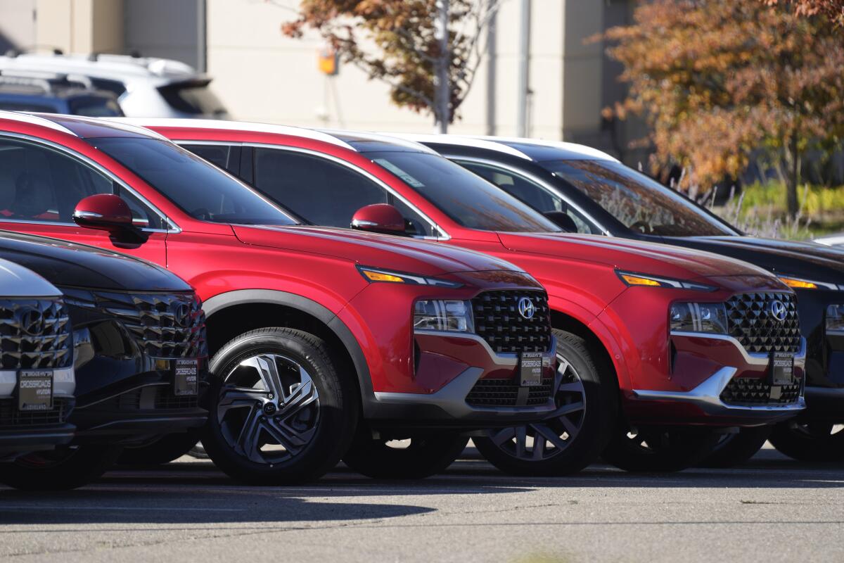 Unsold 2023 Tucson sports-utility vehicles sit at a Hyundai dealership