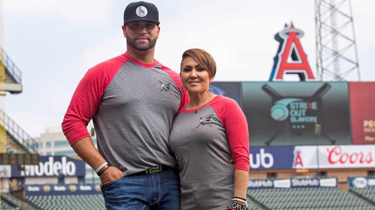 Deidre Pujols with her husband, Albert, a baseball player for the Los Angeles Angels of Anaheim. Deidre Pujols created Open Gate International to provide vocational training to sex trafficking victims.