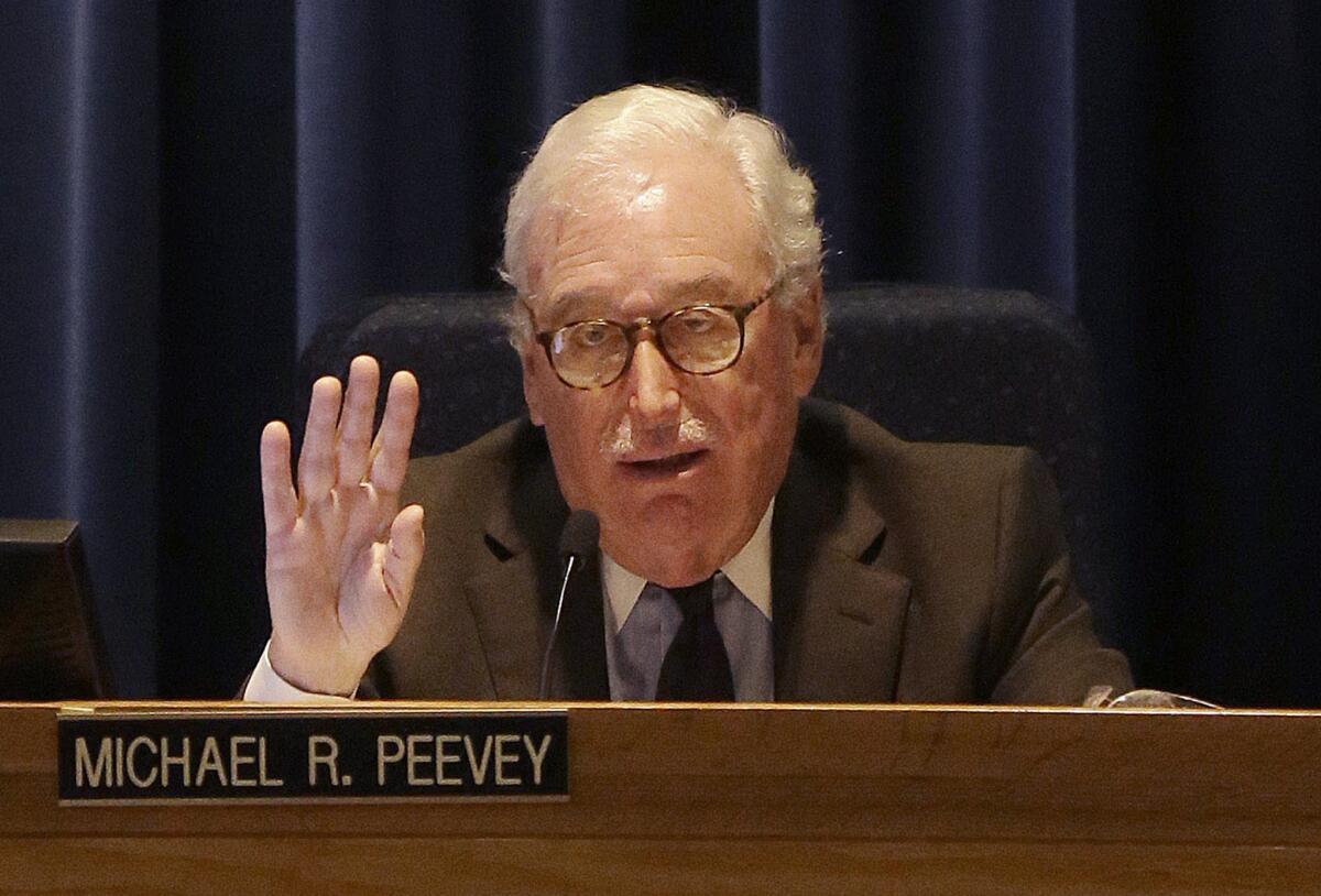 A state administrative law judge ruled Wednesday that Southern California Edison failed to report communications with California public utilities commissioners, including former President Michael Peevey, a possible violation that could carry $34 million in penalties.