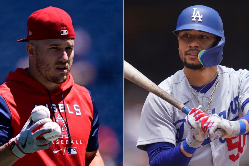 Angels center fielder Mike Trout and Dodgers right fielder Mookie Betts.