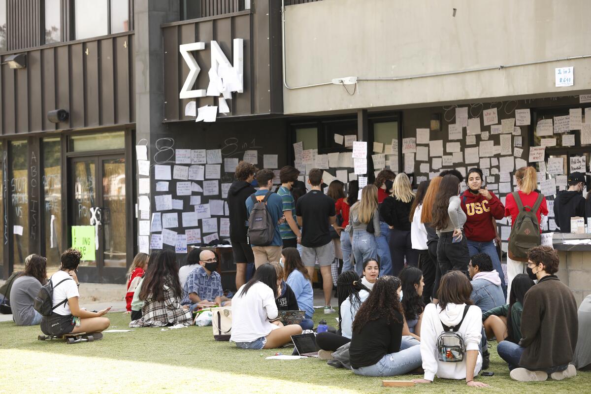 USC students protest outside the Sigma Nu fraternity house. 