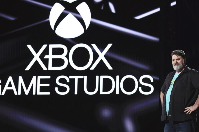 IMAGE DISTRIBUTED FOR XBOX - Tim Schafer, Founder & President of Double Fine Productions, speaks at the Xbox E3 2019 Briefing at the Microsoft Theater at L.A. Live, Sunday, June 9, 2019 in Los Angeles. (Photo by Casey Rodgers/Invision for Xbox/AP Images)