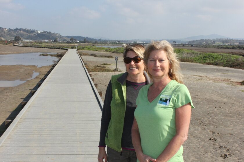 Shawna Anderson, principal planner with the San Dieguito River Park JPA, left, and Trish Boaz, executive director of the San Dieguito River Valley Conservancy, say the boardwalk along the river should remain where it is.