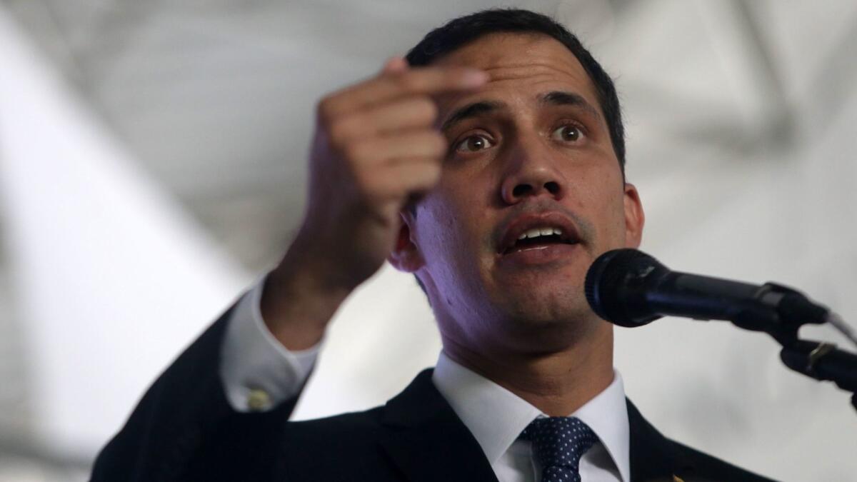 Venezuelan opposition leader and self-proclaimed interim President Juan Guaido speaks during the presentation of the "Country Plan" in Caracas on March 28, 2019.