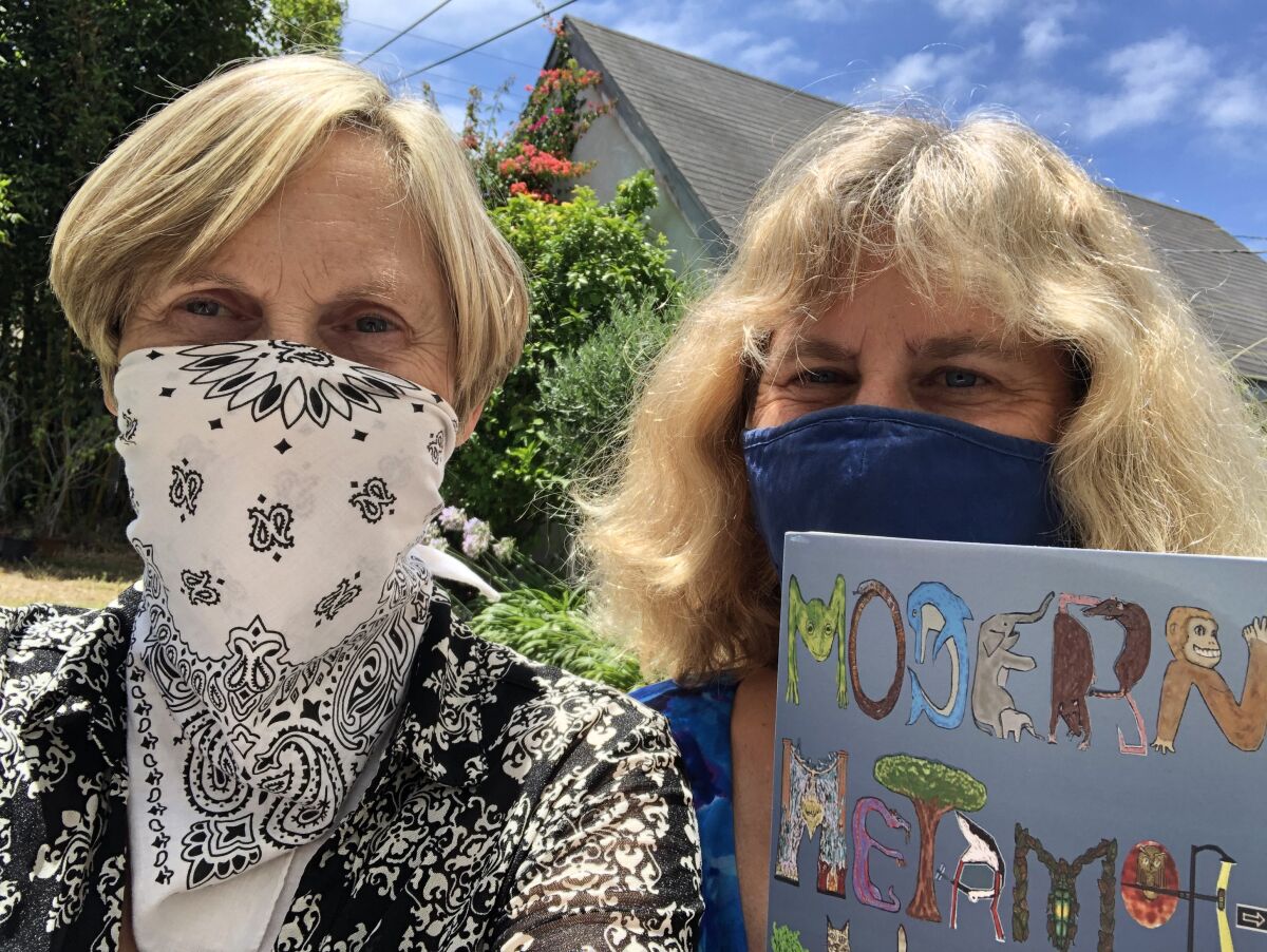 A picture of author Cornelia Feye and fellow writer Tina Childers with their book "Modern Metamorphoses"