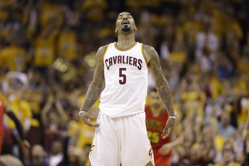 Cavaliers guard J.R. Smith reacts after hitting a three-point shot against the Hawks a second-round playoff series last season.