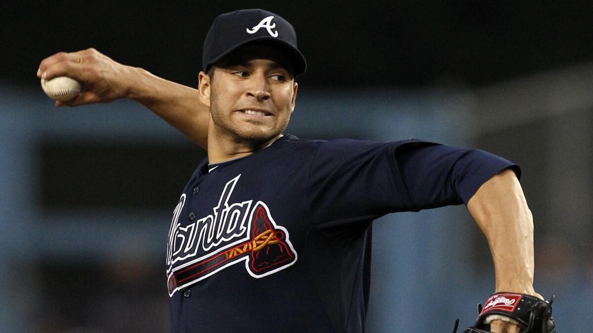 Atlanta Braves starter Brandon Beachy delivers a pitch during a game against the Dodgers in April 2011. Beachy signed with the Dodgers on Saturday.