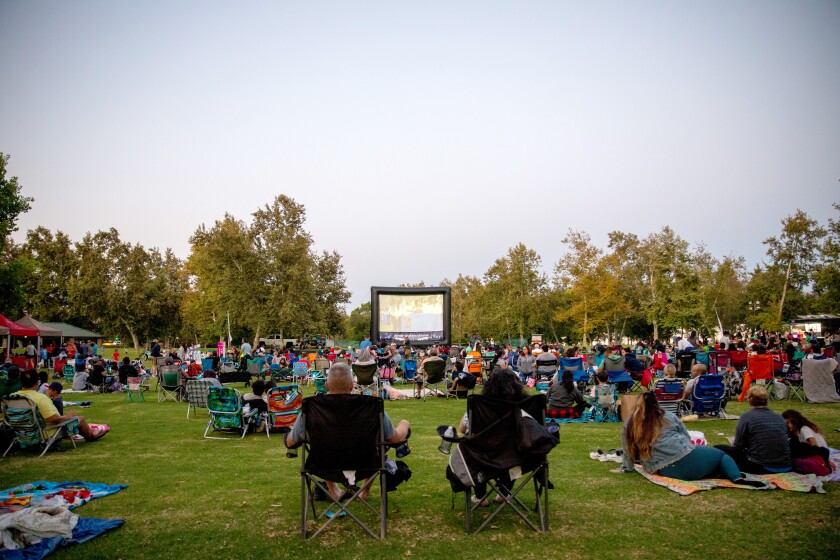 Moviegoers enjoy the screening of "The Sandlot" at Yorba Regional Park in 2021.