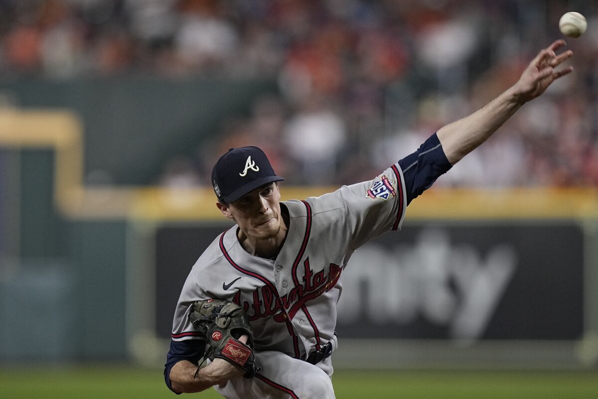 Atlanta Braves starting pitcher Max Fried throws during the fifth inning in Game 6 of baseball's World Series between the Houston Astros and the Atlanta Braves Tuesday, Nov. 2, 2021, in Houston. (AP Photo/Eric Gay)