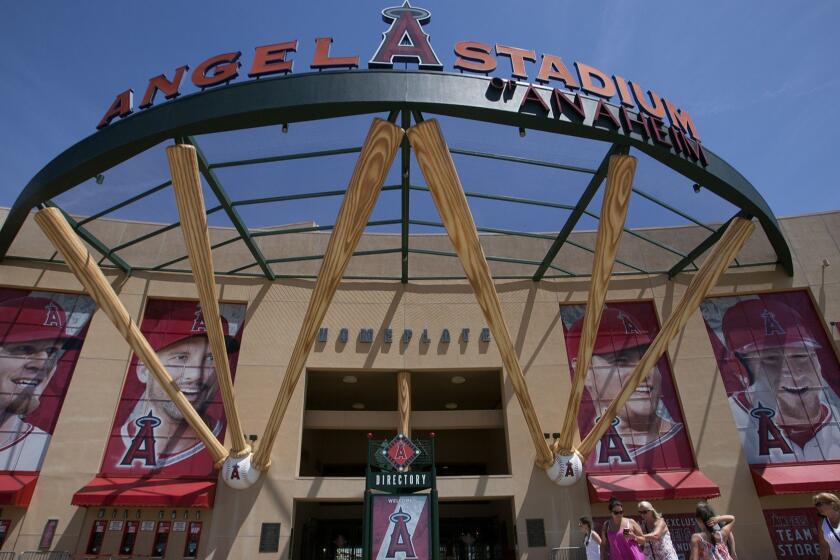 ANAHEIM, CA, April 20, 2016 -- Visitors explore the grounds of Angel Stadium in Anaheim on Wednesday, April 20. (Kevin Chang/ Weekend)