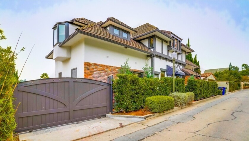 The Tudor-style spot has three bedrooms and 3.5 bathrooms in about 2,100 square feet.